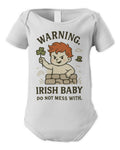 White baby bodysuit with cartoon warning text and leprechaun illustration